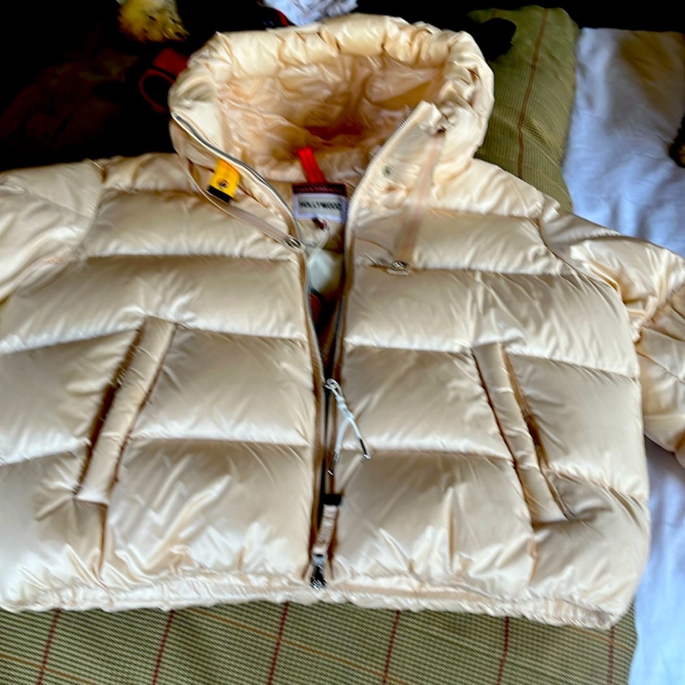 Para Jumpers coat . A beautiful pair of jumper jacket, puffy, champagne, color.